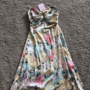 Beautiful mid length floral dress! Strapless, never worn tag still on!